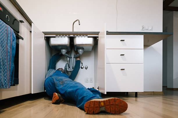 Professional Plumbing technician working in Central Village, CT